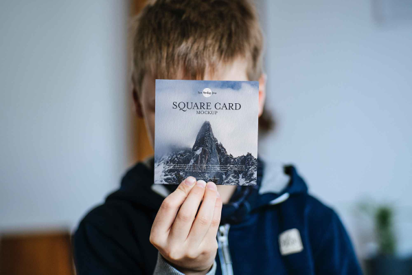 Boy Showing Square Card Mockup