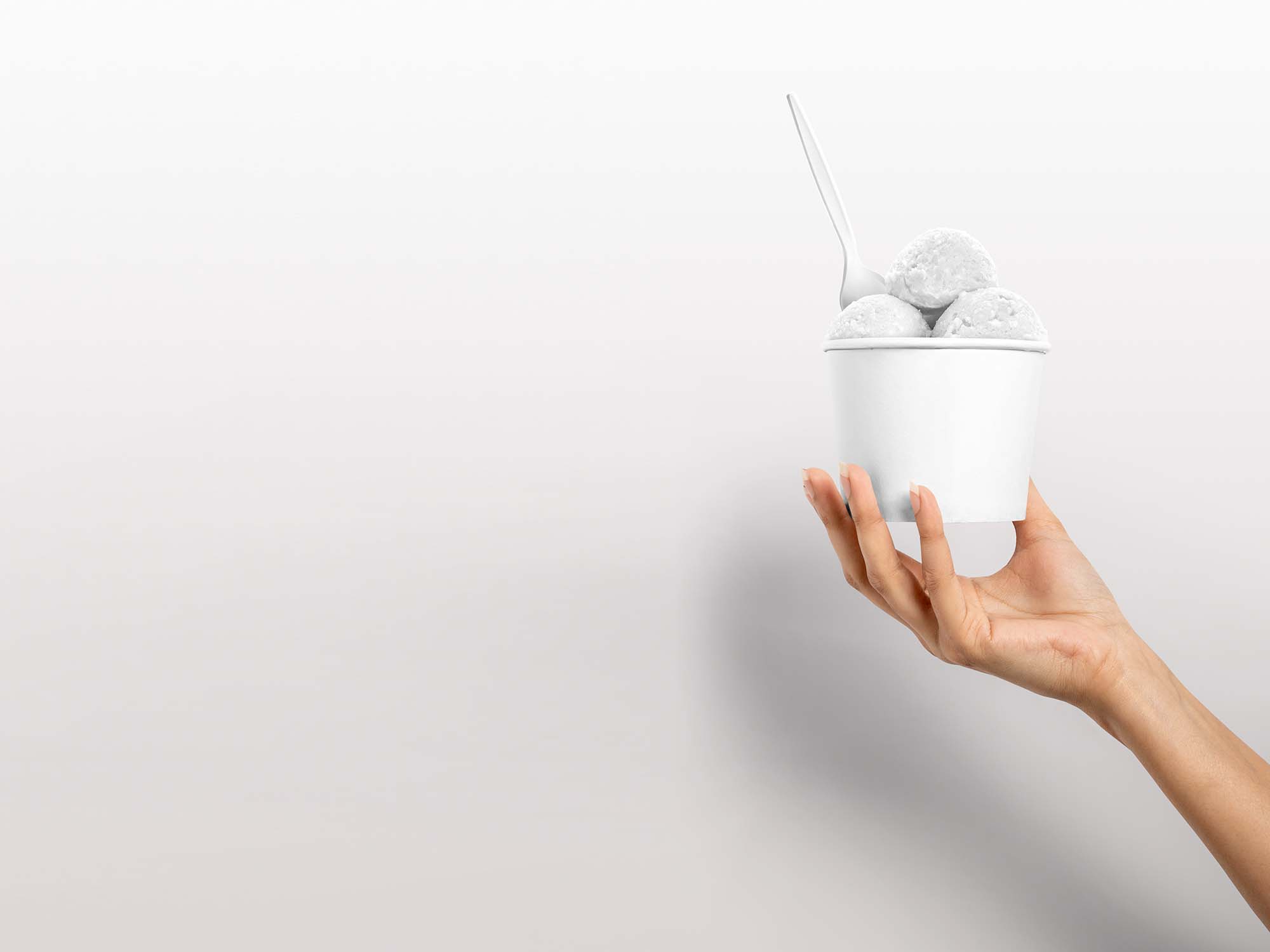 Download Ice Cream Cup in Hand Mockup (Free) by Pixpine