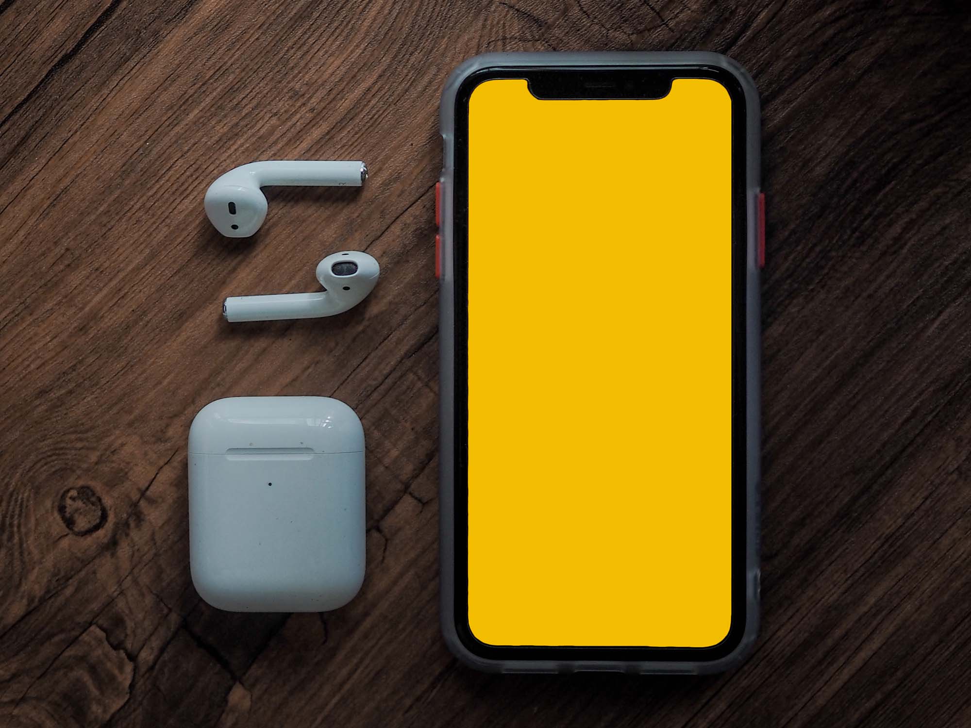 Download iPhone and AirPods PSD Mockup (Free) by Mckups
